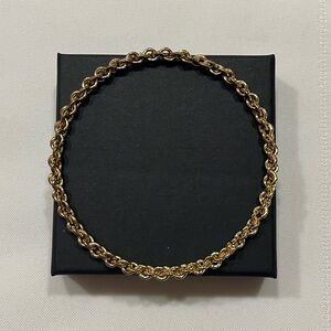 Gold tone bangle bracelet